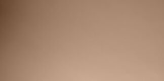 open book on top of several stacked books