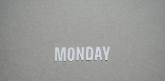 the word monday is cut out of white paper