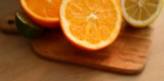 a bottle of gummy vitamins sitting on top of a wooden table