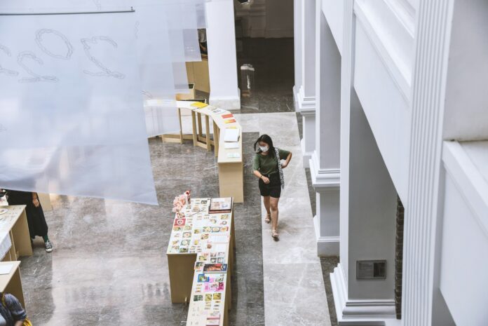 a man walking down a hallway
