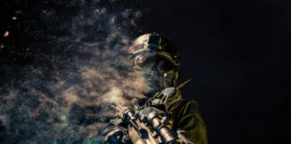 man holding rifle wallpaper