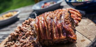 grilled meat on brown chopping board