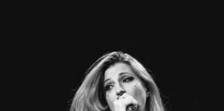 woman in black and white floral long sleeve shirt