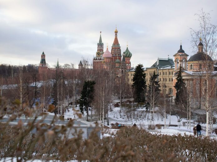 a view of a city with a lot of trees and buildings
