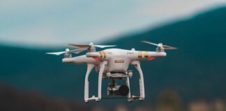 selective focus photography of DJI Phantom 3 Professional quadcopter drone