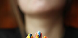 woman's nails with manicure