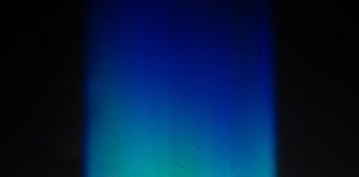 a blurry image of a building in the dark