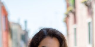 selective focus photography of woman wearing black off-shoulder blouse