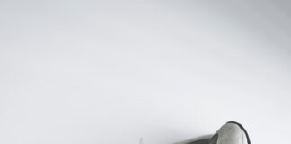 gray and white nike athletic shoe