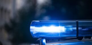 a close up of a police car with its lights on