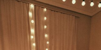 couple lying in carpet with candlelight