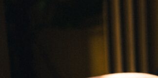 white printer paper on black textile