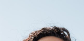 woman with brown hair smiling