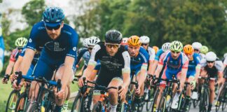 group of cyclist on asphalt road