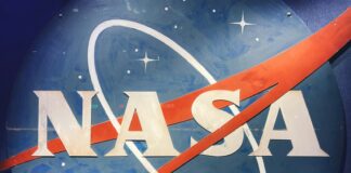 a nasa sign with the word nasa painted on it