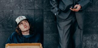 man holding cardboard box