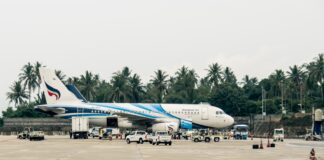 group of people near airplane
