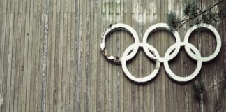 Olympic symbols on wooden wall