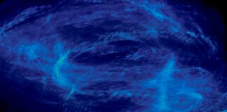 a very large blue object in the sky