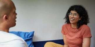 a man and a woman sitting on a couch