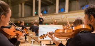 orchestra playing their piece