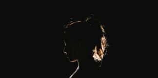 a black silhouette of a woman