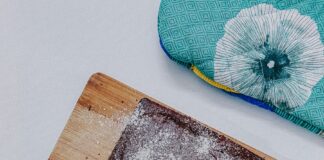 brown wooden chopping board on brown wooden chopping board