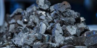 A pile of coal sitting on top of a table