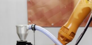 A 3D printer is manufacturing an object.