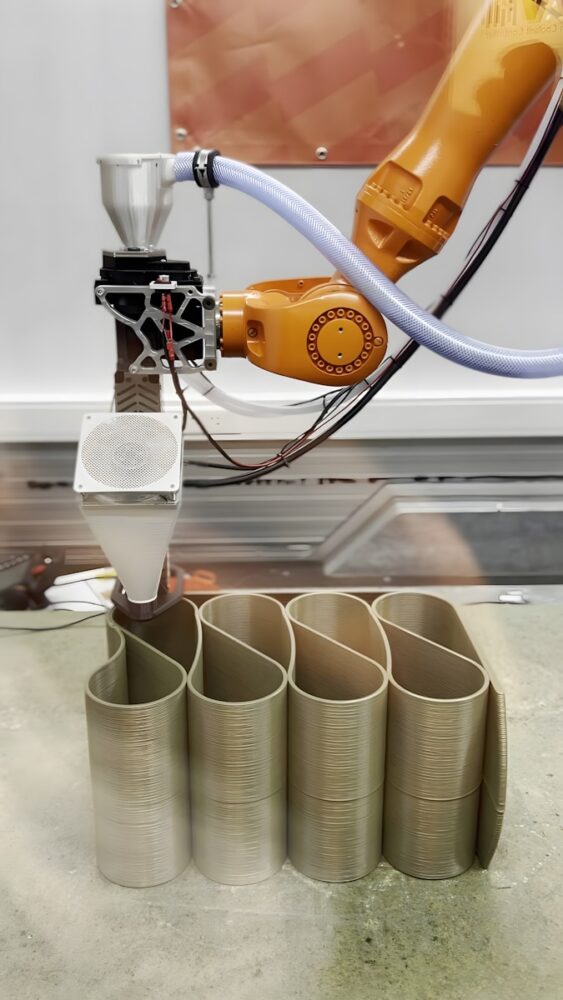 A 3D printer is manufacturing an object.