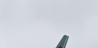 A german junkers ju 52 airplane flies.