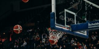 people watching basketball game