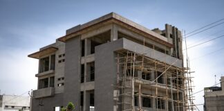 brown concrete building under blue sky during daytime