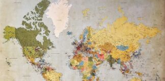 blue, green, and yellow world map