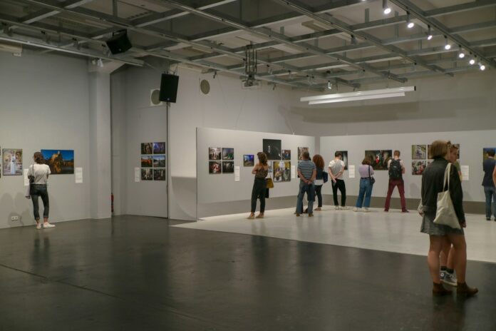 people standing on gray floor