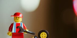 lego minifig on white table