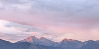 A view of a city with mountains in the background