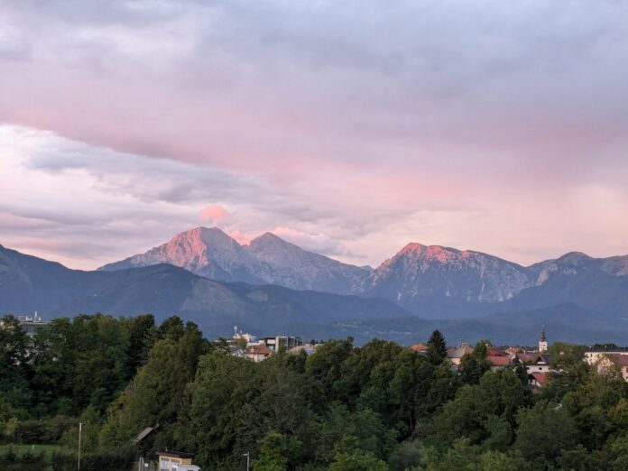 A view of a city with mountains in the background